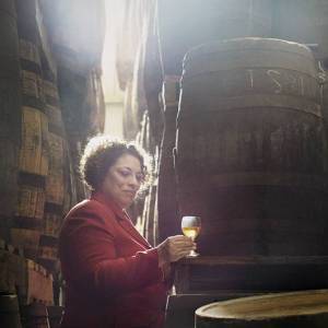 Joy Spence in the barrel warehouse